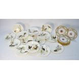 A Victorian porcelain dessert service comprising four tazzas and ten plates,