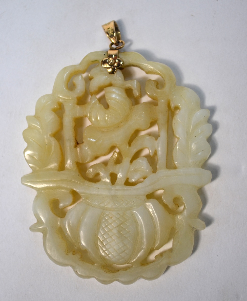 Two green jade pendants of reticulated form: one decorated with a flower arrangement; - Image 3 of 5