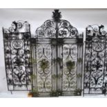 A pair of 18th/19th century wrought iron rose garden gates and pair of matching side panels