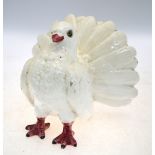 A ceramic figure of a fantail pigeon, un-marked, 20 cm wide,