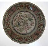 A Swatow, or other Chinese provincial large circular dish, decorated in black,