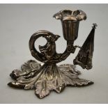 A Victorian silver taperstick of floral and leaf design, with conical snuffer, Henry Wilkinson & Co.