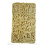 A Chinese Canton ivory card case carved with figures, buildings and trees, 19th century, 9.5 x 5.