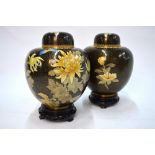 A pair of Chinese cloisonne enamel oviform jars and covers;