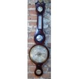 G Jacob, Winchester, a boxwood banded mahogany wheel barometer with silvered dial, thermometer,