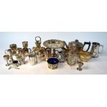 A non-matching silver baluster pepperette, open salt and mustard,