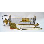 A 19th century brass rail and steel wired fire guard to/w a set of three fire tools,