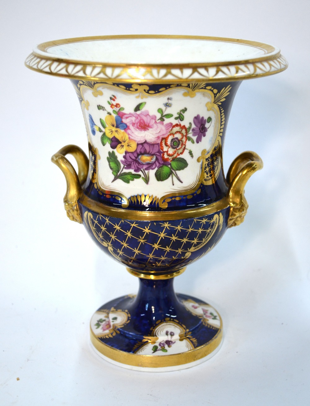 A blue-ground, campana-shaped vase with gilt handles, decorated with panels of floral designs, - Image 8 of 12