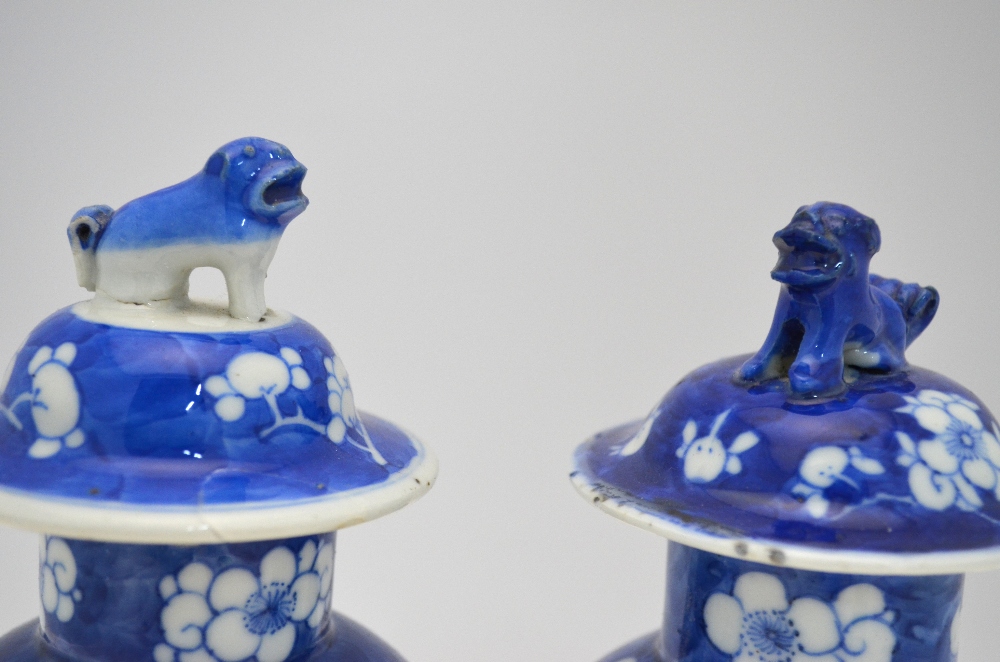 A pair of blue and white vases and covers; 26 cm high; each base with a Kangxi four-character mark, - Image 8 of 8