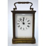 A lacquered brass carriage clock, the eight-day movement signed ACC,