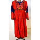 A 1970s ethnic style cotton dress with embroidered bib,