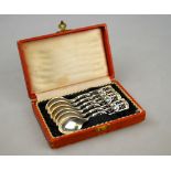 A cased set of six Danish design coffee spoons with pierced foliate handles, Johannes Siggaard,