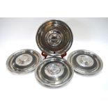 A set of four chrome Bentley wheel-hubs,