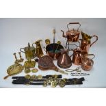 A quantity of copper and brassware, including two kettles, a footman,