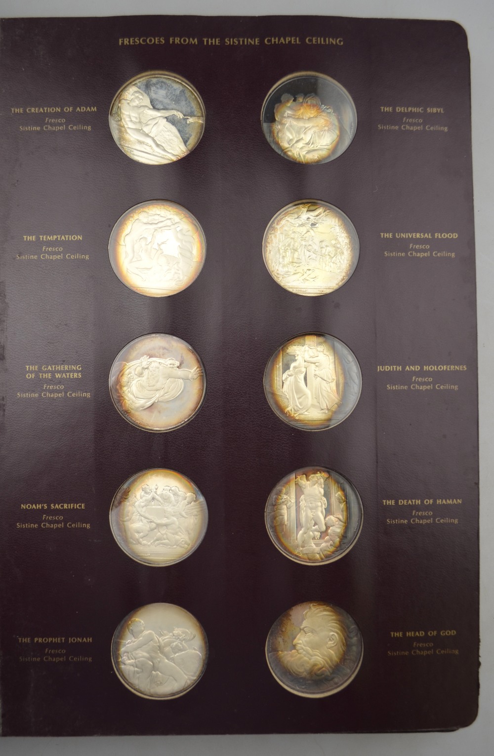 A John Pinches album containing and part-set of forty-one silver medallions from the 'Genius of - Image 2 of 4