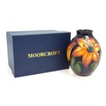 A Moorcroft ovoid vase decorated with 'Tigris Lilies' pattern after Rachel Bishop,