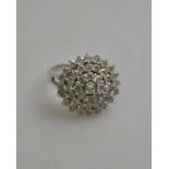A diamond set large ballerina-style cluster ring,