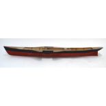 A vintage wooden pond-model hull of a Victorian paddle-steamer,