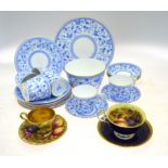 A Victorian Crown Derby part tea service decorated with a blue and white transfer print of birds in