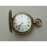 A late Victorian lady's silver hunter fob-watch with engraved case,