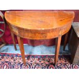 A George III cross-banded mahogany demi-lune card table,