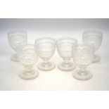 A set of six large Victorian heavy ornate cut glass goblets, 14.5 cm h.