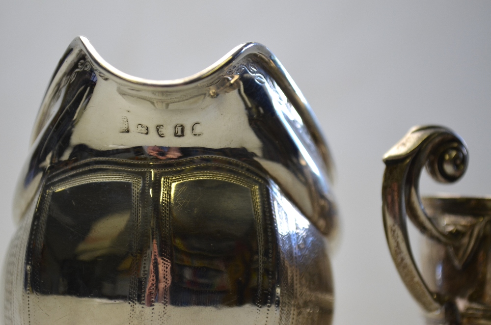 A George III engraved silver milk jug, London 1804, 4. - Image 3 of 3