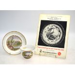 A Pinxton, Derbyshire cup and saucer; the saucer decorated with a river landscape,