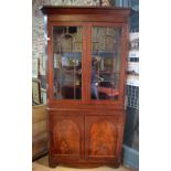 Large Victorian flame mahogany corner cabinet in two parts,