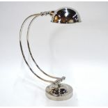 An Art Deco style nickel-plated adjustable desk lamp with half-hoop stand