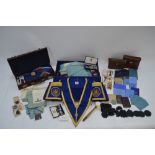 A large quantity of Masonic regalia including silver and other jewels, apron, cuffs, sashes,