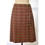 A G Gucci green/pink checked, leather trimmed skirt (30" waist) and a Hermes,