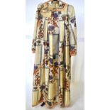 A 1970s Jean Varon cream grosgrain silk evening dress printed with botanical flora with cream