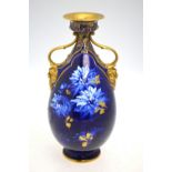 A Doulton/Burselm blue-ground vase with gilt handles and interior,