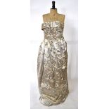 A 1950s duchess satin floral embossed evening gown with ruched bodice,