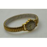 A lady's Tissot 9ct wristwatch on a gilt expanding strap