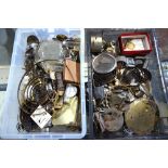 Two boxes of clock and watch parts, including movement, dials,