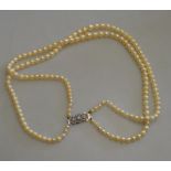 A double row of graduated cultured pearls on marcasite snap