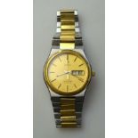 A gentleman's Omega Seamaster stainless steel and gilt watch with quartz movement, case no 1345,