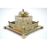 An electroplated galleried inkstand with hobnail-cut glass ink well,