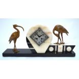 Vandeplanche, Tourgoing, an Art Deco slate and onyx eight-day mantel clock,