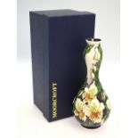 A Moorcroft vase decorated with the 'Gladioli' pattern after Kerry Goodwin,