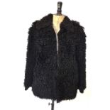 A black curly Mongolian lamb jacket, 50 cm across chest,