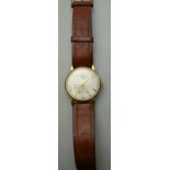 A gentleman's 9ct gold Smiths Deluxe wristwatch,