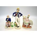 Three Victorian Staffordshire flatbacks - figure of a sailor, 27 cm h.