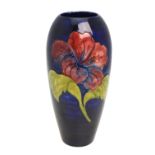 A large Moorcroft ovoid vase, blue ground decorated with the 'Hibiscus' pattern,