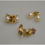 Three pairs of stud earrings including two cultured pearl and one pair with amethyst and diamond