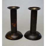 A pair of Art Deco style tortoiseshell candlesticks with removable silver sockets (possibly