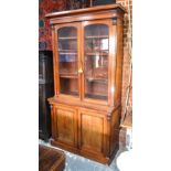 A Victorian mahogany library bookcase, in two parts,