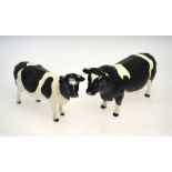 Two Beswick models - Friesian Bull 'Ch. Coddington Hilt Bar', no 1439A and Friesian cow' Ch.